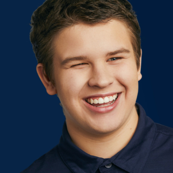 Smiling boy after Invisalign treatment